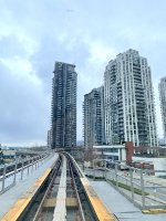 Passing through Coquitlam after departing Lafarge Lake-Douglas Station